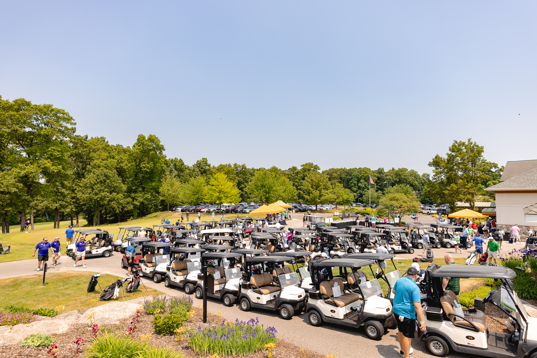 Rows of golf carts lined up outside the clubhouse on the morning of the Mary Free Bed Open