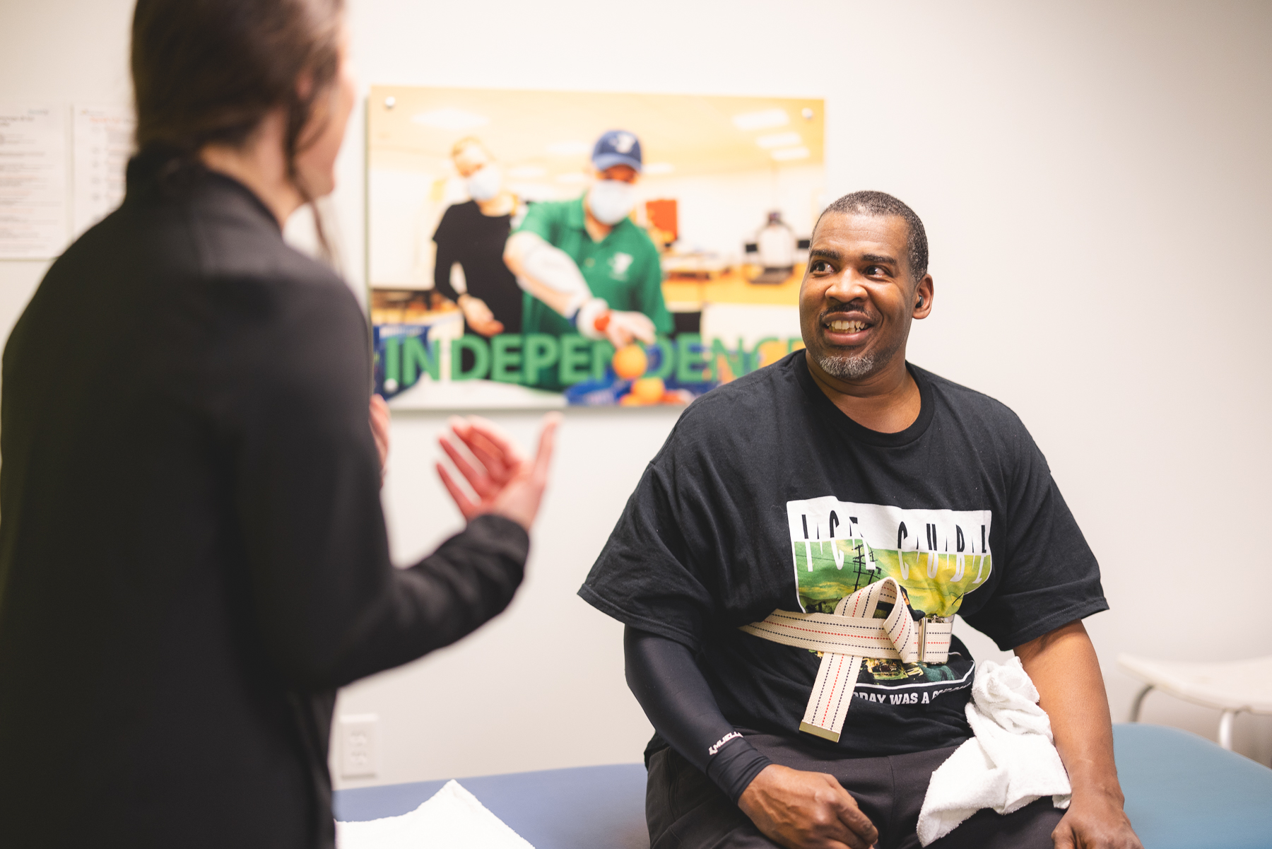 Dion smiling during a session with his therapist