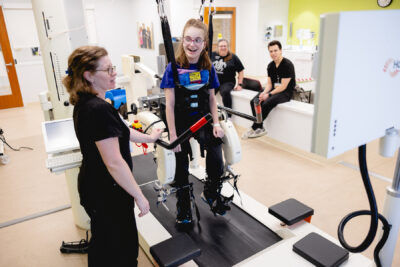 Cerebral Palsy patient using lokomat for therapy with Mary Free Bed therapist