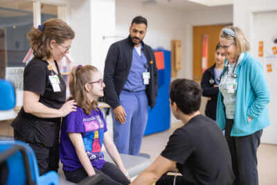cerebral palsy patient with Mary Free Bed therapists