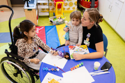 child life specialist with patient