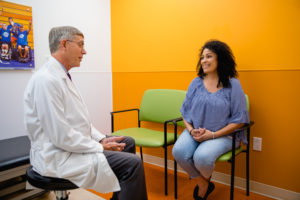 Dr. Hudson meets with patient