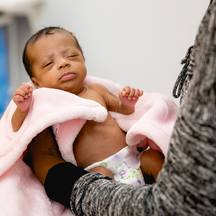 Brain Injury 48 baby in pink blanket