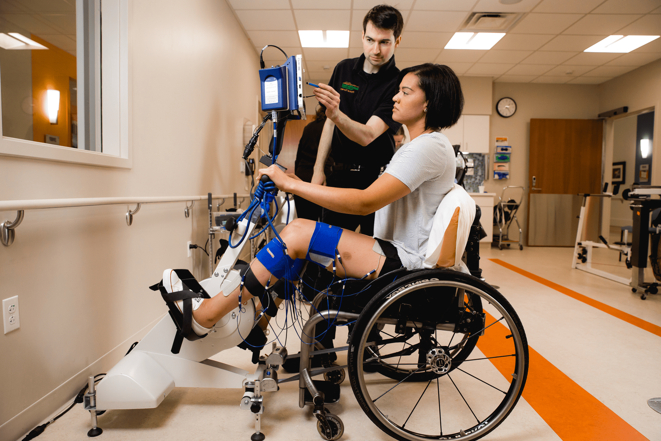 Brain Injury 43 Patient in a wheelchair getting help for a spinal cord injury.