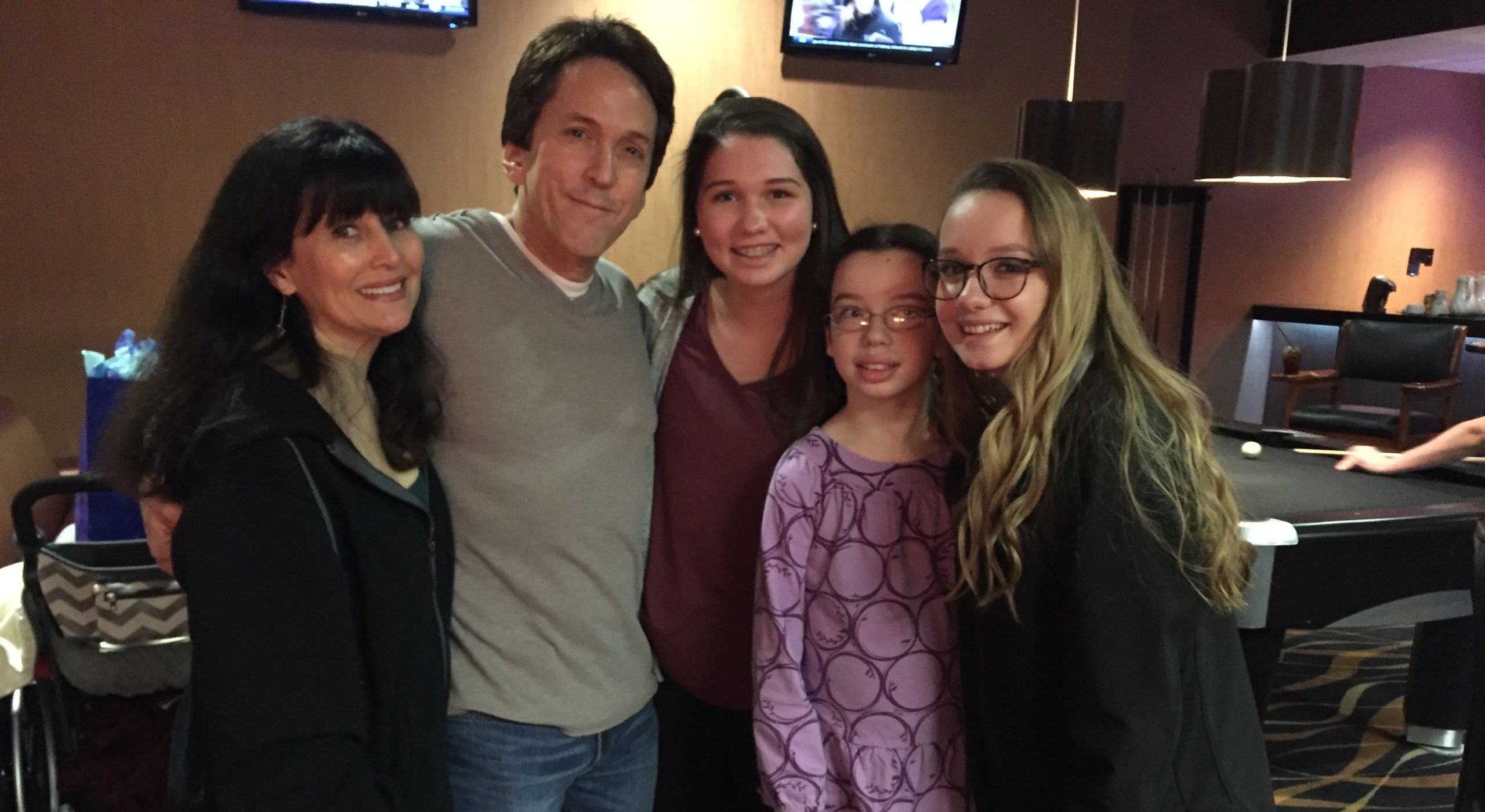 The Kelly family with Mitch Albom