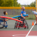 Kids playing at Jr. Wheelchair Sports Field Day