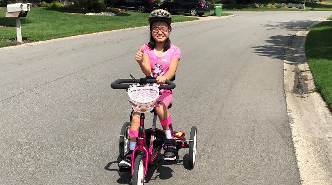 ShenaLi on her bike