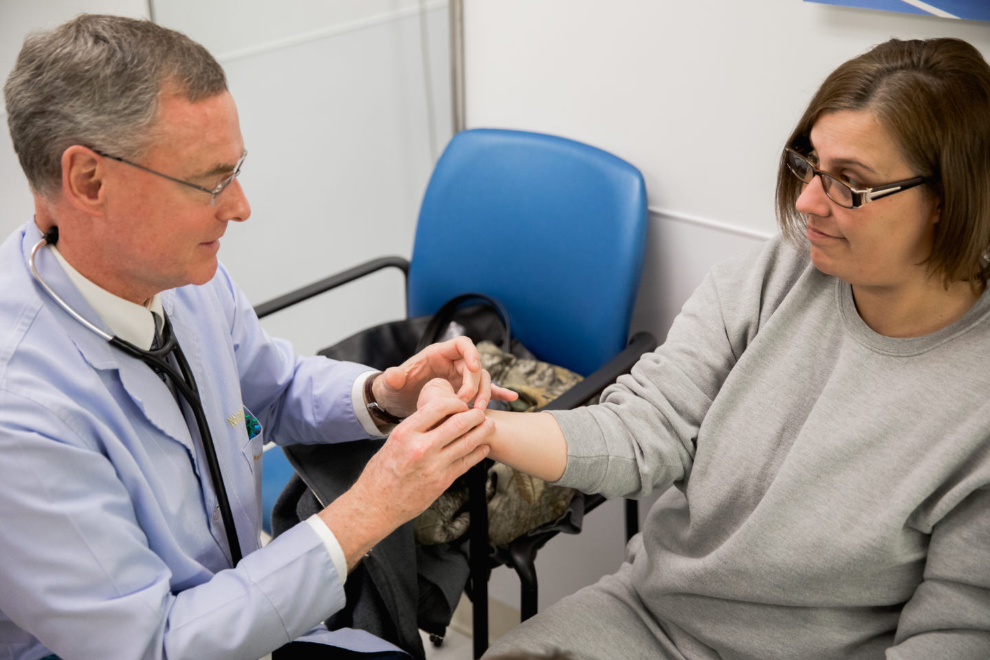 Dr. Bruinsma with amputation patient