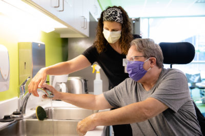 Patient Al Walczak and therapy in ADL kitchen