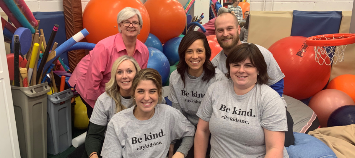 Instructor Kacy Hertz, in pink, with the Mary Free Bed team at certification. Front row, left to right: Elle Augustine and Kate Rustem. Back row, left to right, Jennifer Mazurkiewicz, Andrea Dennis and Micah Huegel.