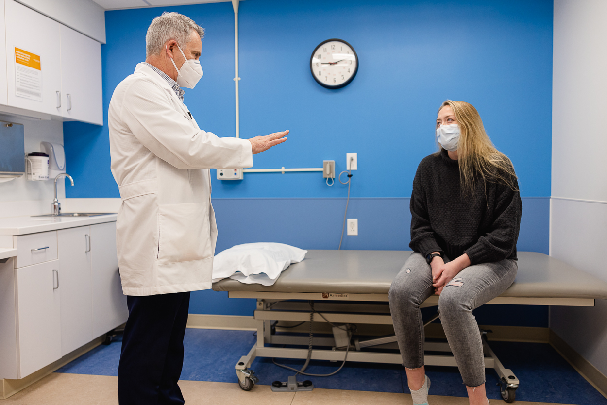 Dr. Tom Fowler, chiropractor, with patient