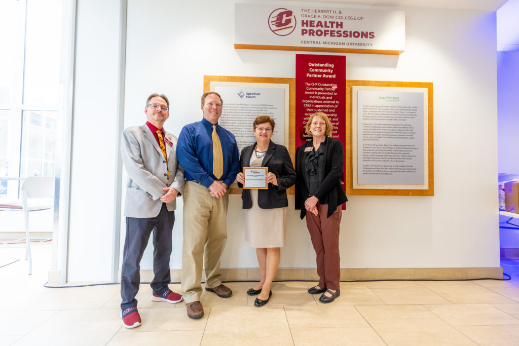 Mary Free Bed staff accepted the 2022 CMU Community Partner Award. 