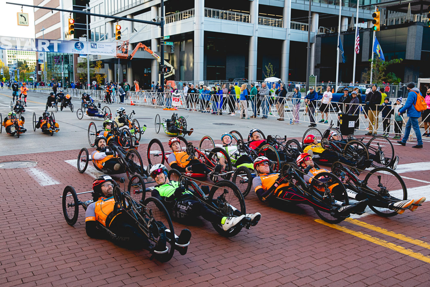 Handcycle racers at a starting line