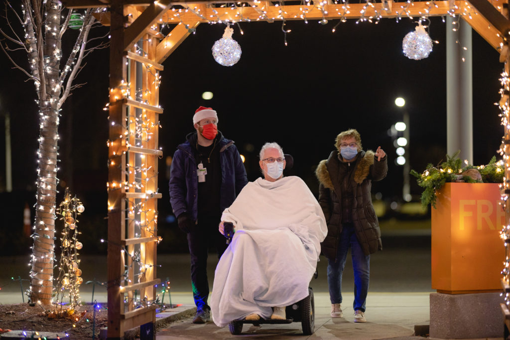Patients and their families enjoy the Mary and Brite holiday lights at Mary Free Bed