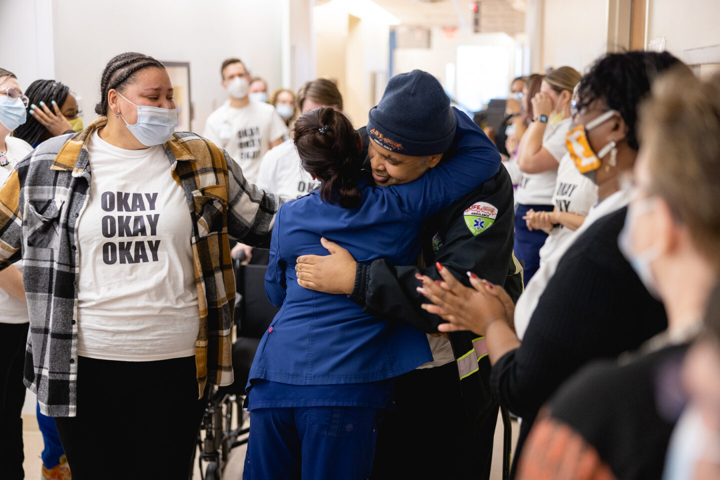 Lavell and his nurse embrace each other on his graduation day.