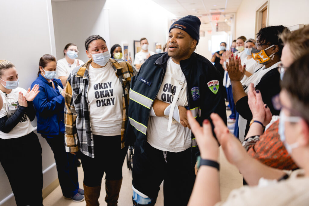 Lavell and Destiny are cheered on by their friends, family and therapy team on his graduation day.