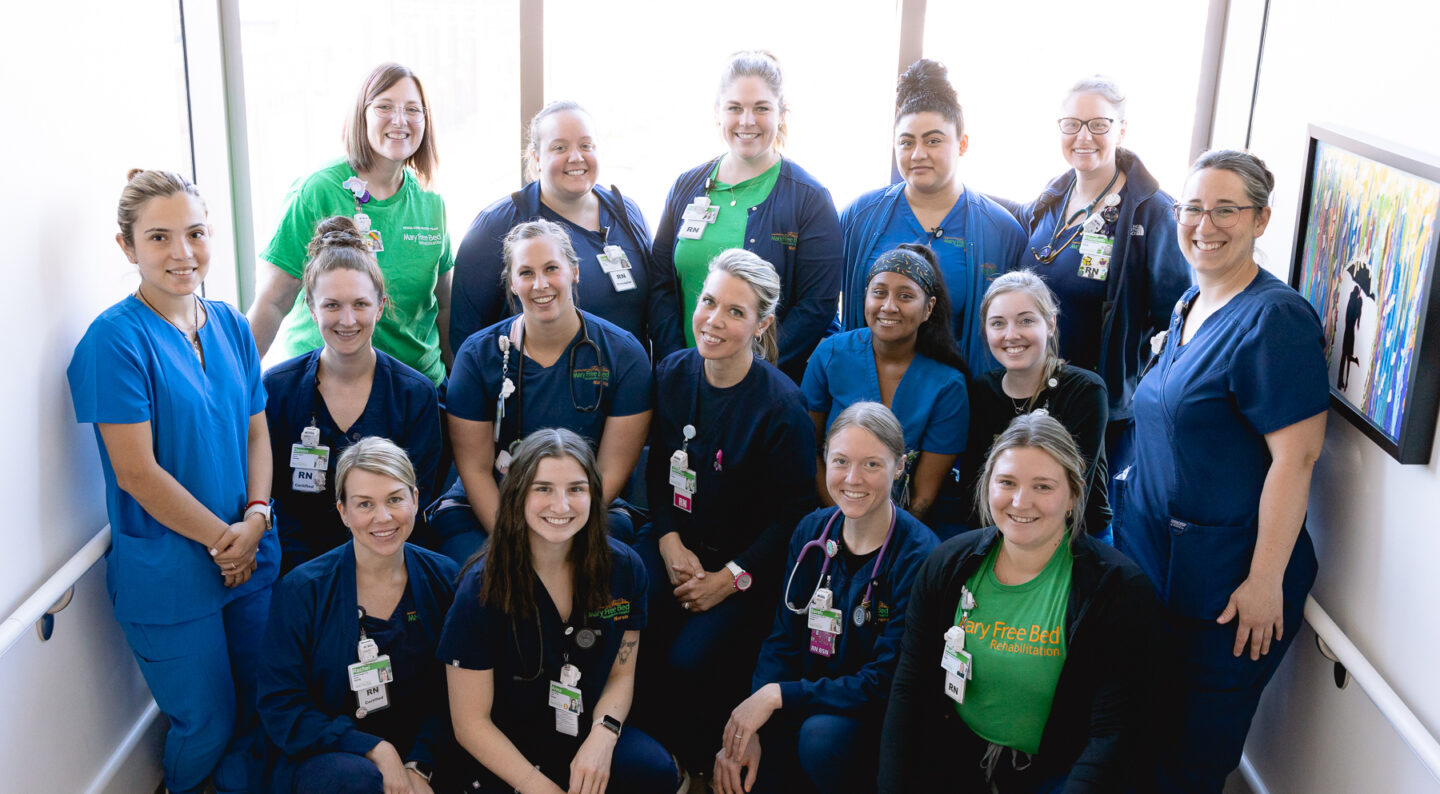 A group of Mary Free Bed nurses smiling