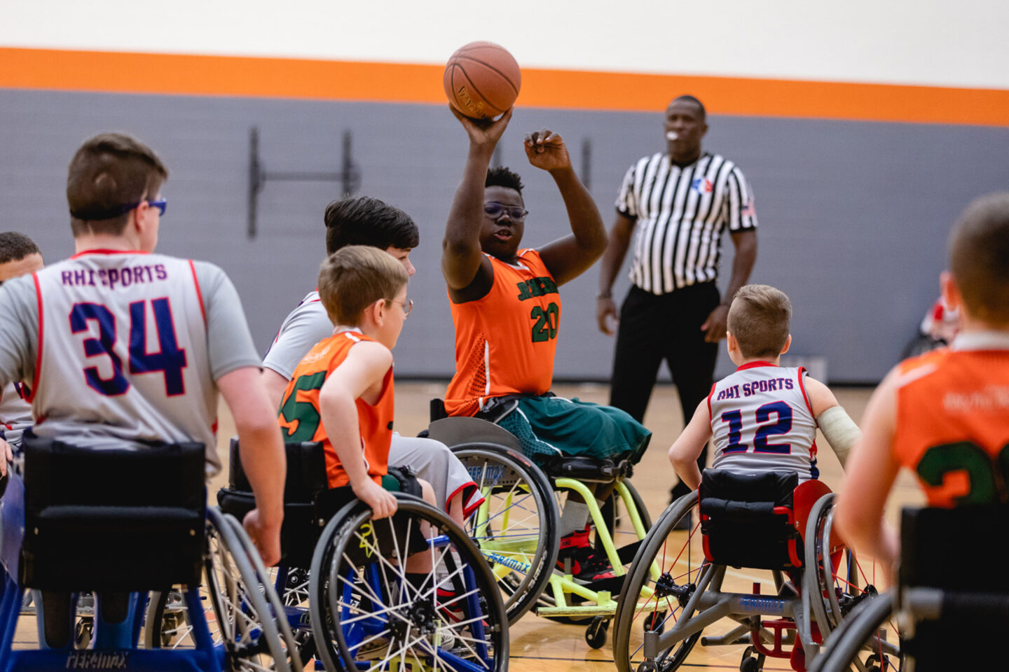 Kids playing wheelchair basketball