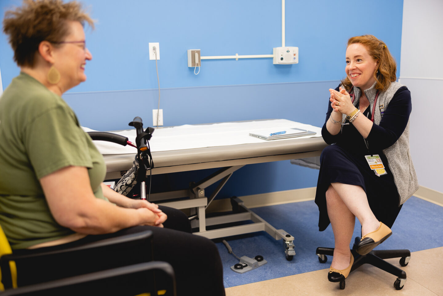 Doctor conducting a comprehensive bone health evaluation with a patient.