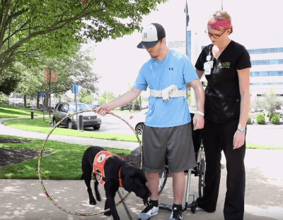 Brandon McElhenie gets ‘stronger day by day’ after off-road vehicle crash, walks out doors at graduation 19 Brandon McElhenie Patient story e1500993295550