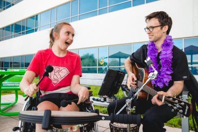 Hard work, lots of laughter help 14-year-old Kendall on long path to recovery 5 Peds Kendall Hicks Patio Party May 2018 0914 e1532535264336