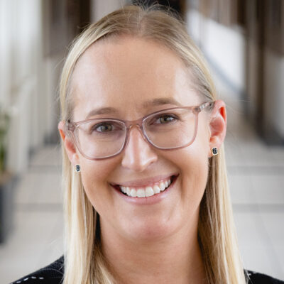 Professional headshot of Dr. Emily Gladstone.