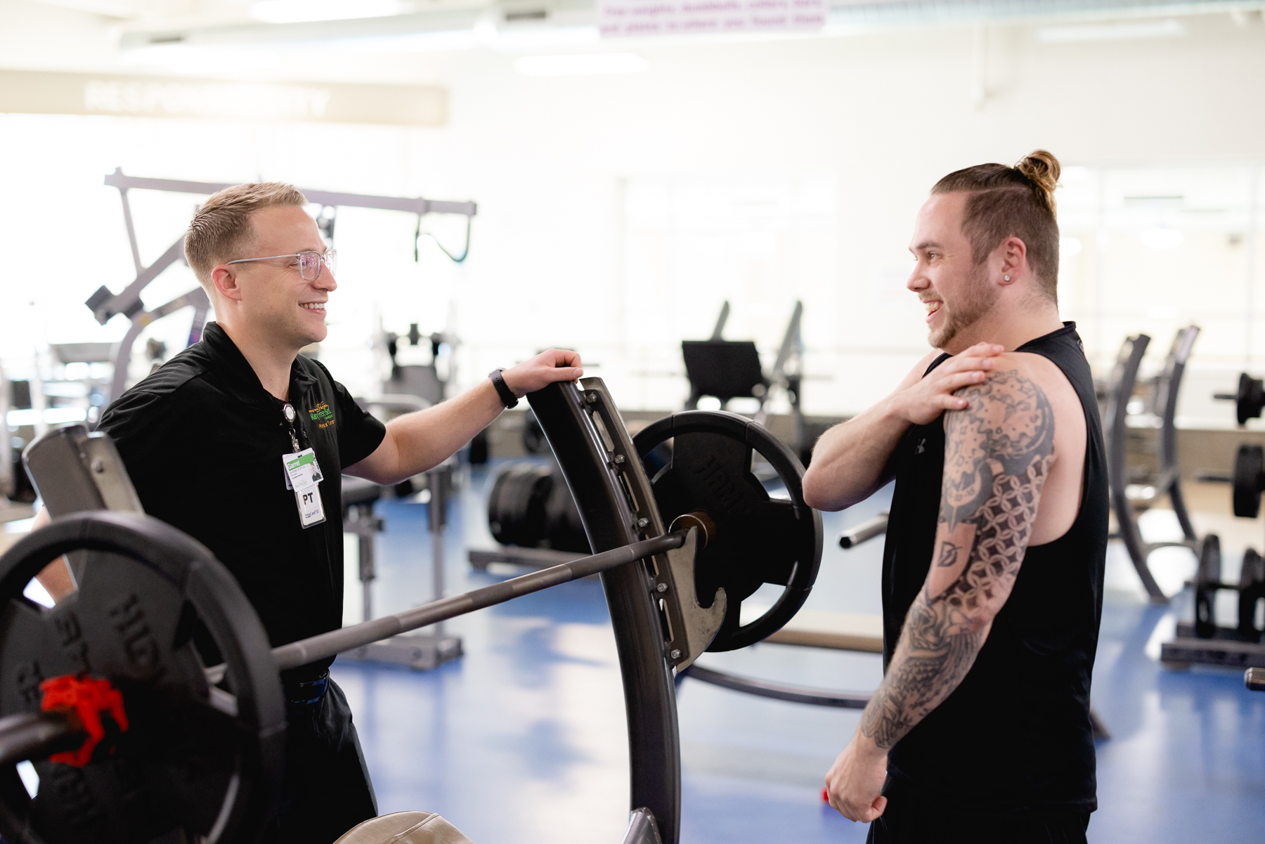 Patient and specialist working on sports rehabilitation.