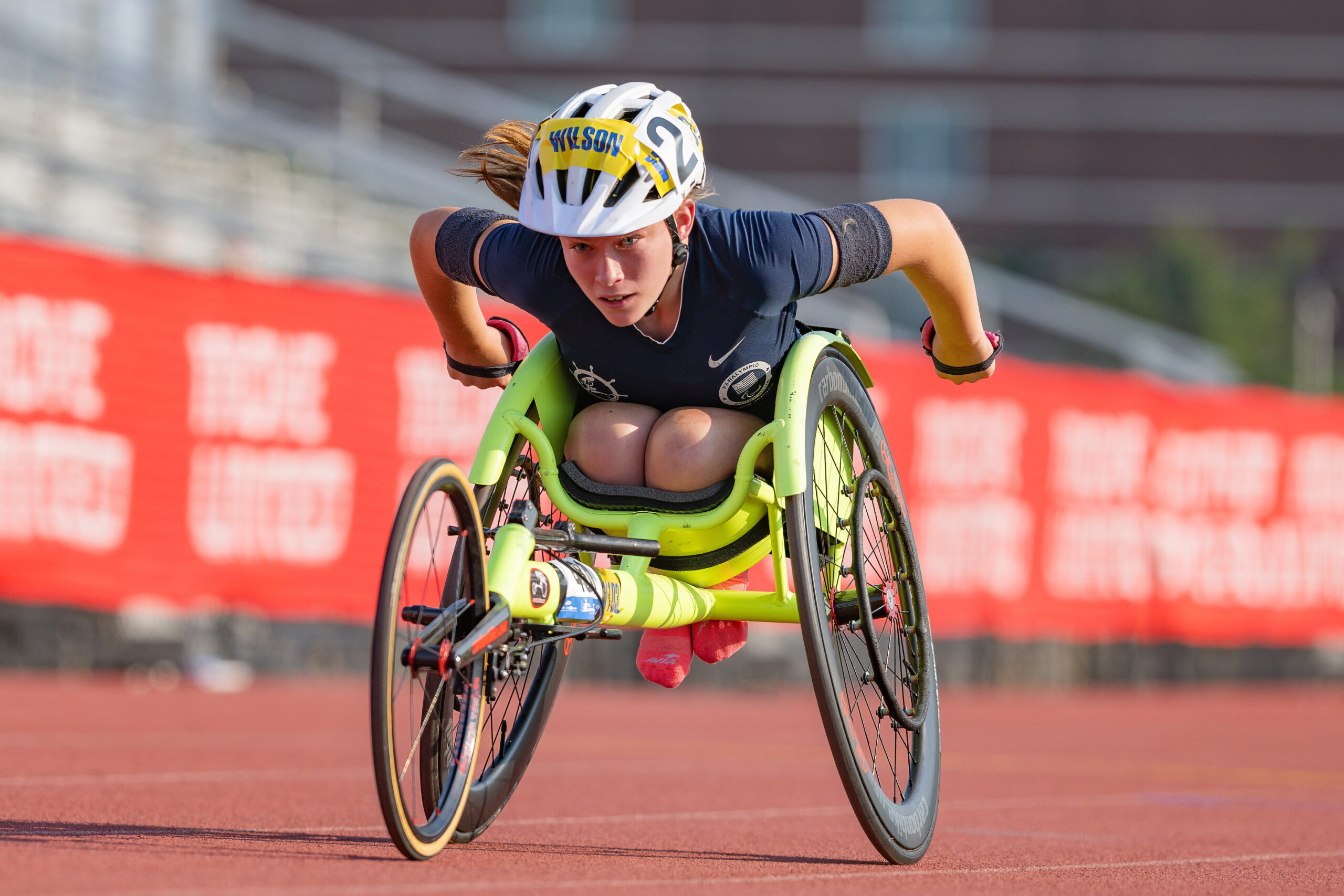 Woman races in The Hartford Nationals in Grand Rapids.