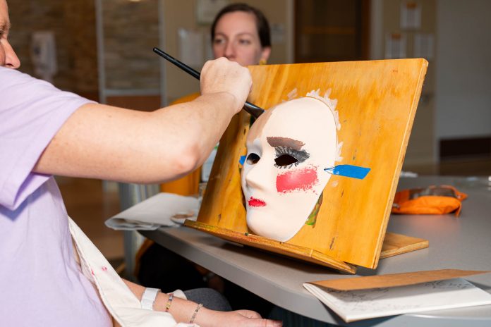 In The Media 83 Patient doing art therapy.
