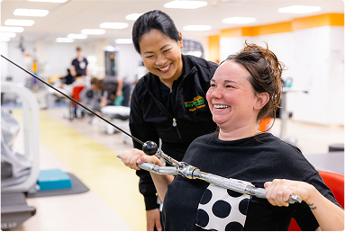 physical therapist and patient doing exercise
