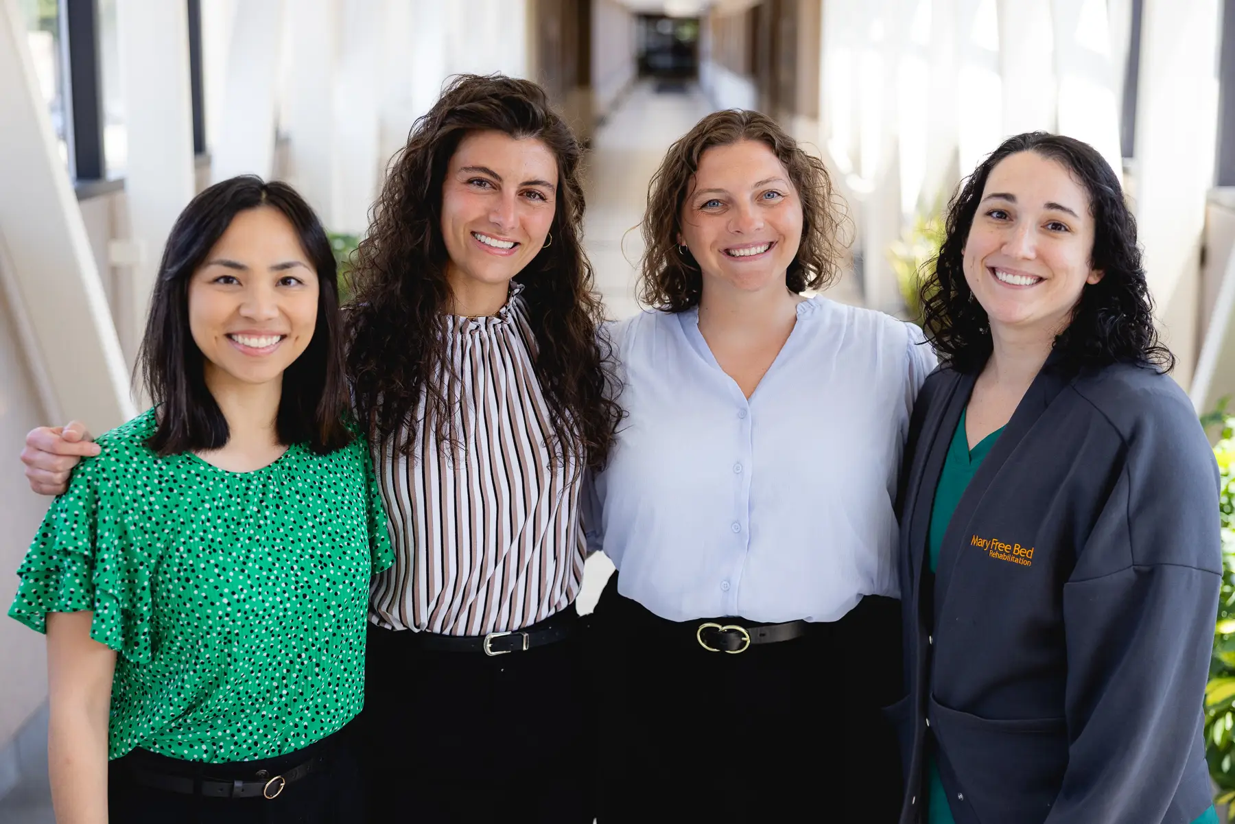 Smiling professionals in Mary Free Bed's PM&R Residency program.